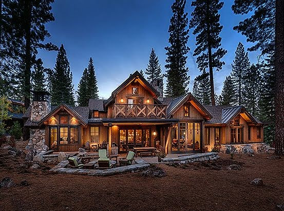 large rustic home in the woods