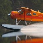 plane landing on lake