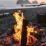 roasting marshmallows with campfire on beach