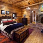 rustic bedroom with fireplace