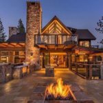 rustic home with outdoor kitchen and fire pit