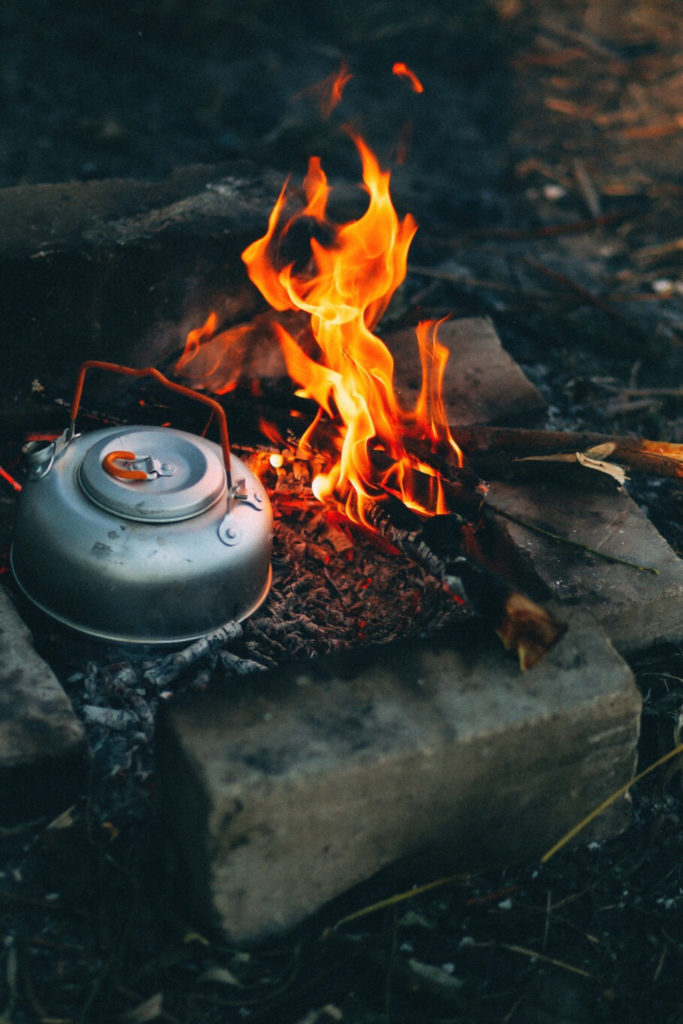 campfire with kettle
