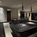 modern mens game room with pool table