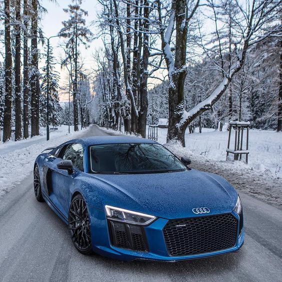 blue audi in the snow