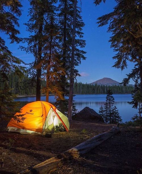 tent near mountain lake