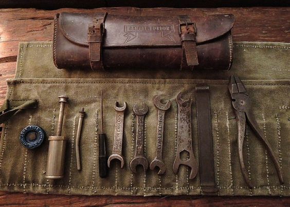old tools with roll up case