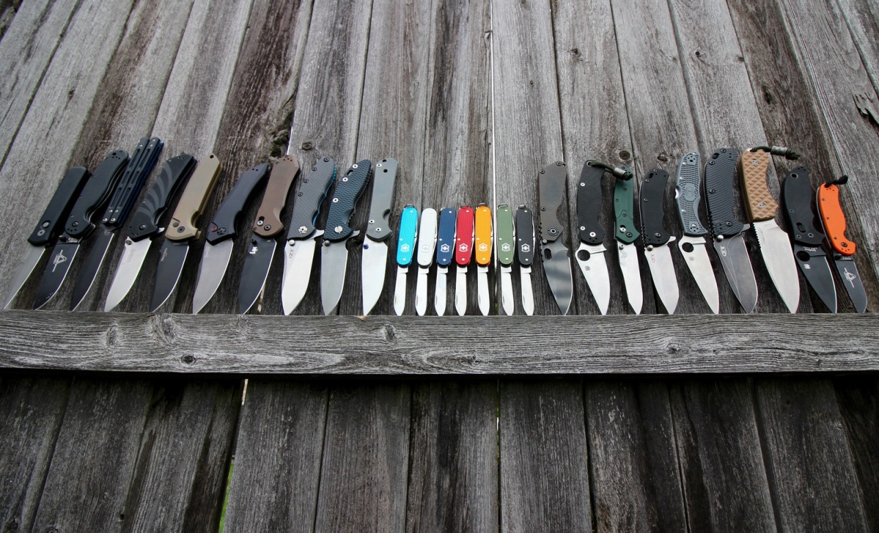 knife collection on fence
