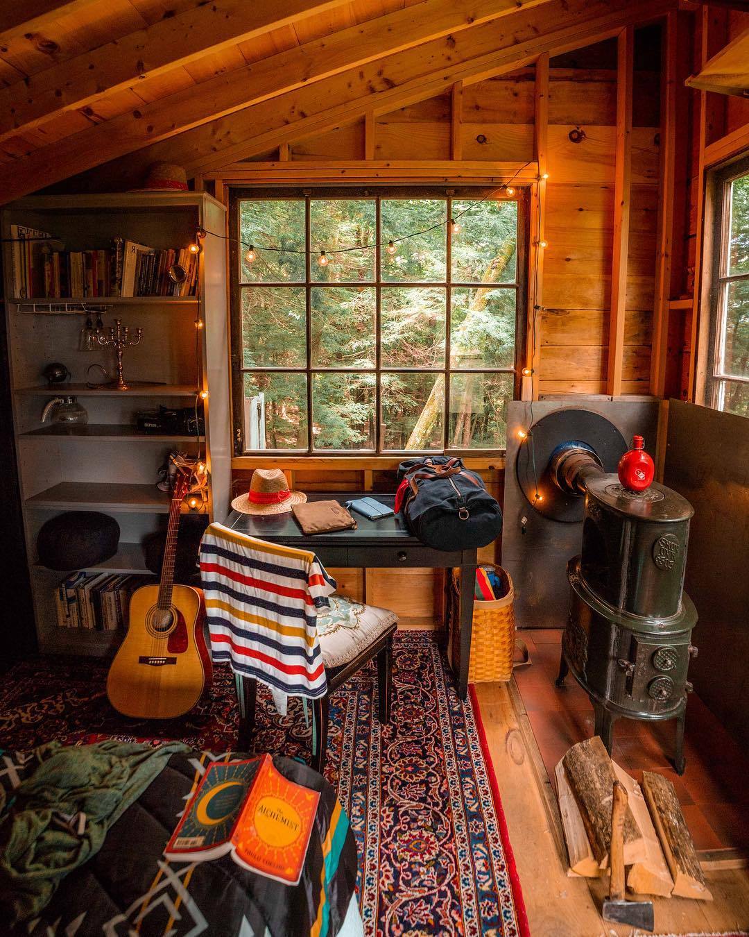 warm and cozy cabin interior with wood burning stove
