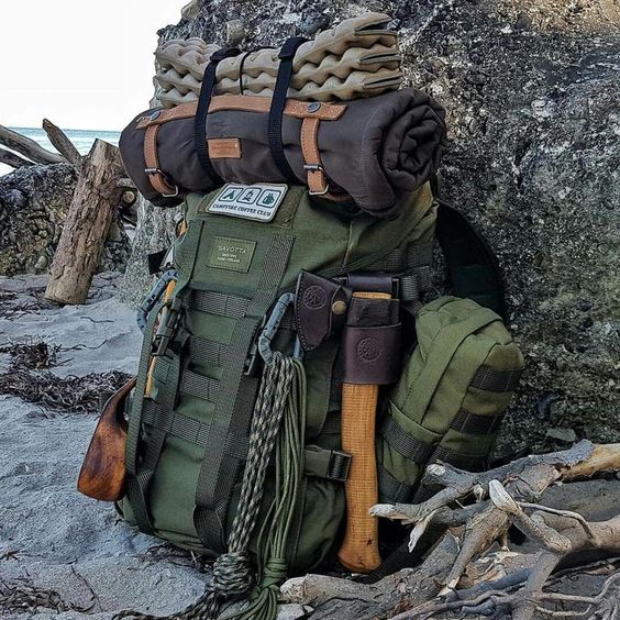 backpack with axe and camping gear