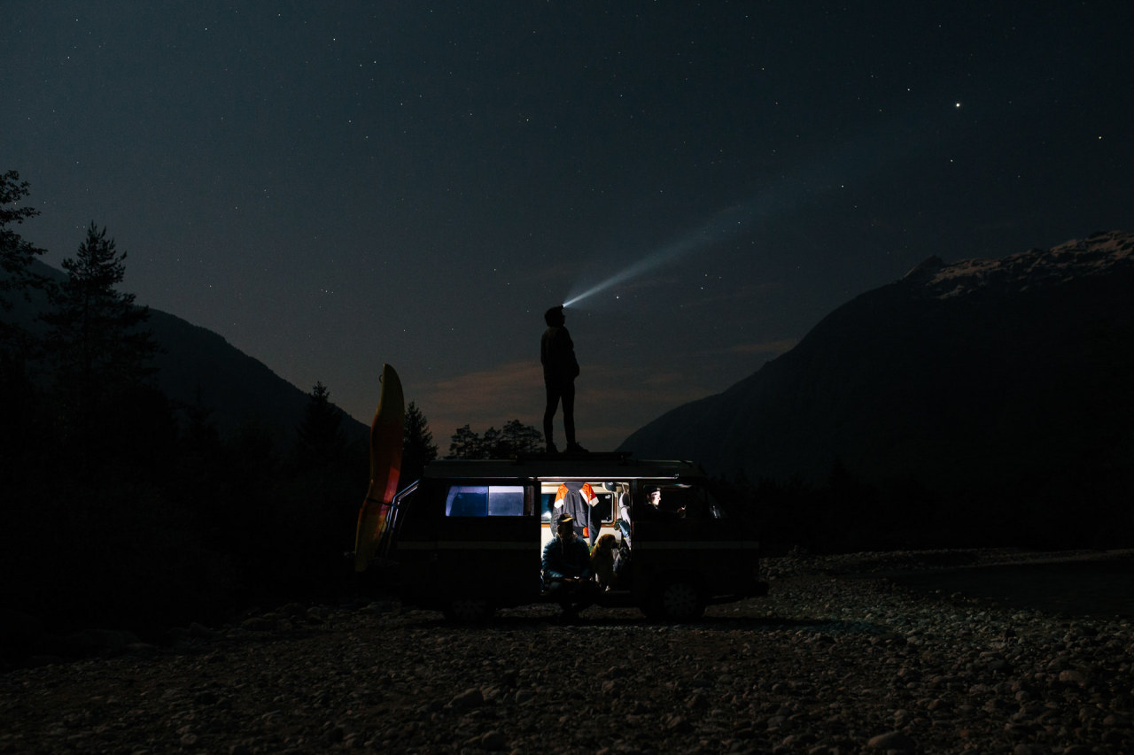 camper van in wilderness at night