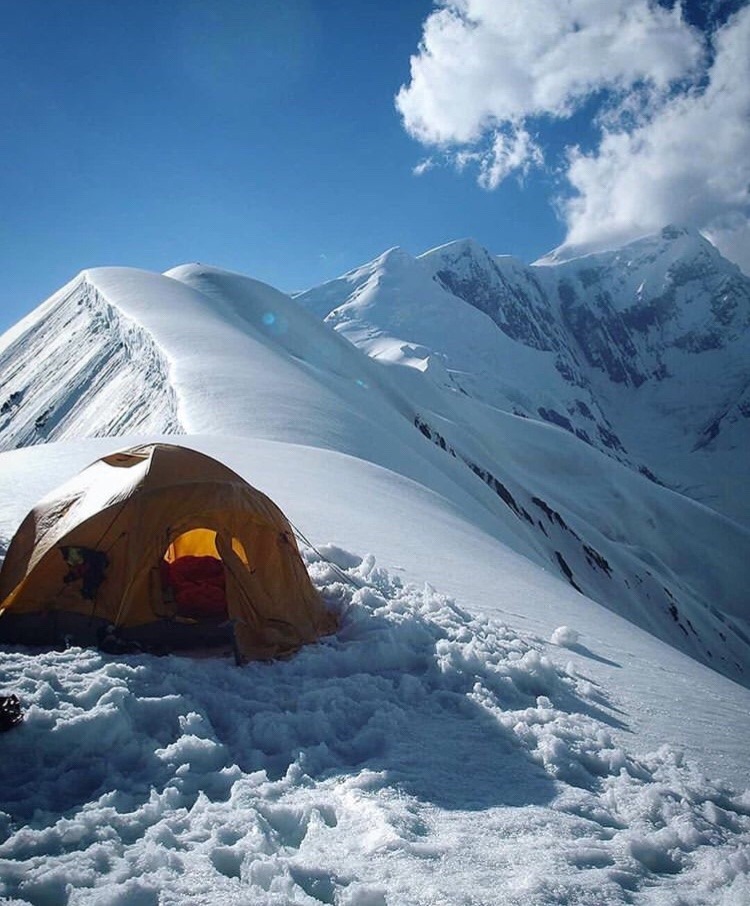 tent on snow-covered mountain top