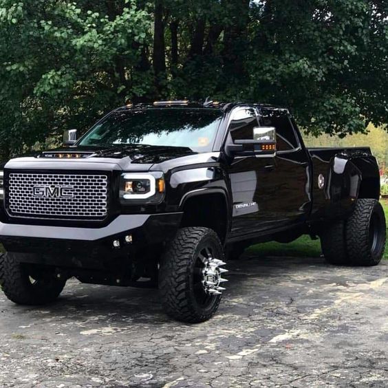 mean looking black gmc dually truck