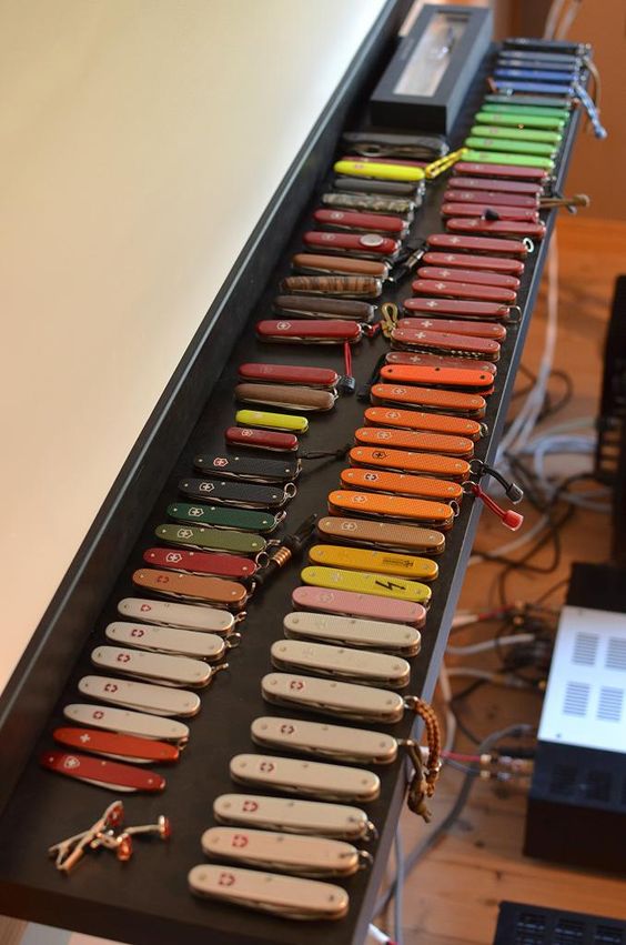 colorful collection of pocket knives