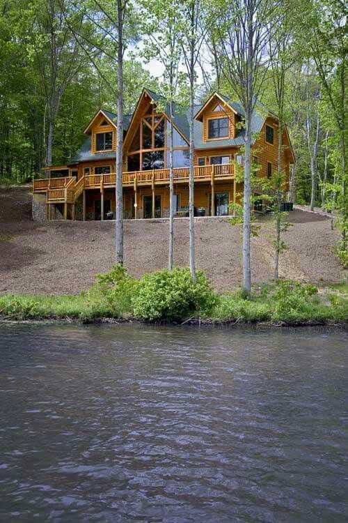 large rustic home on a lake