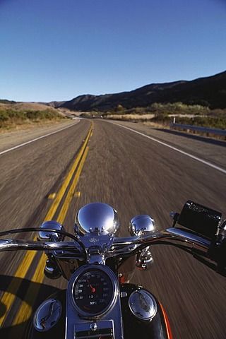 open road view from motorcycle