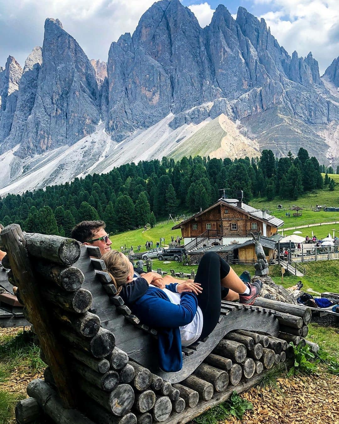 couple relaxing with view of mountains