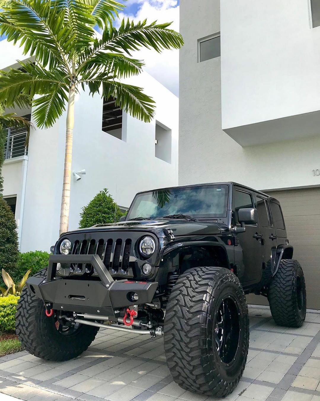 black jeep in driveway