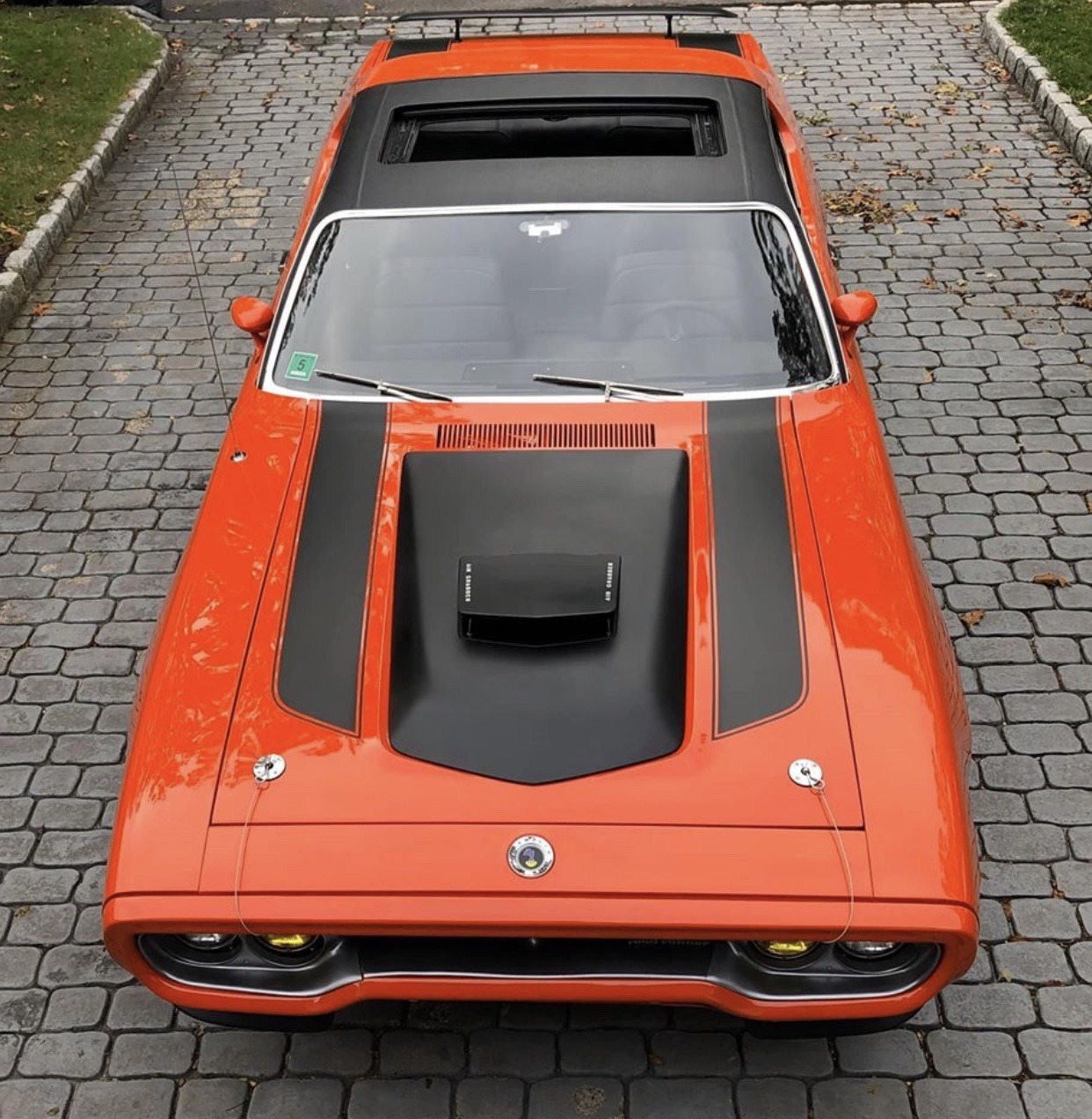 orange dodge muscle car