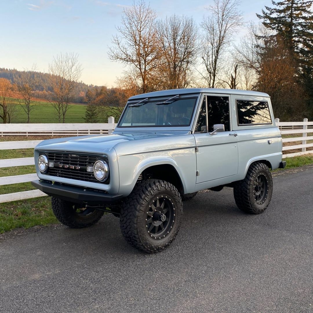 classic ford bronco with black wheels