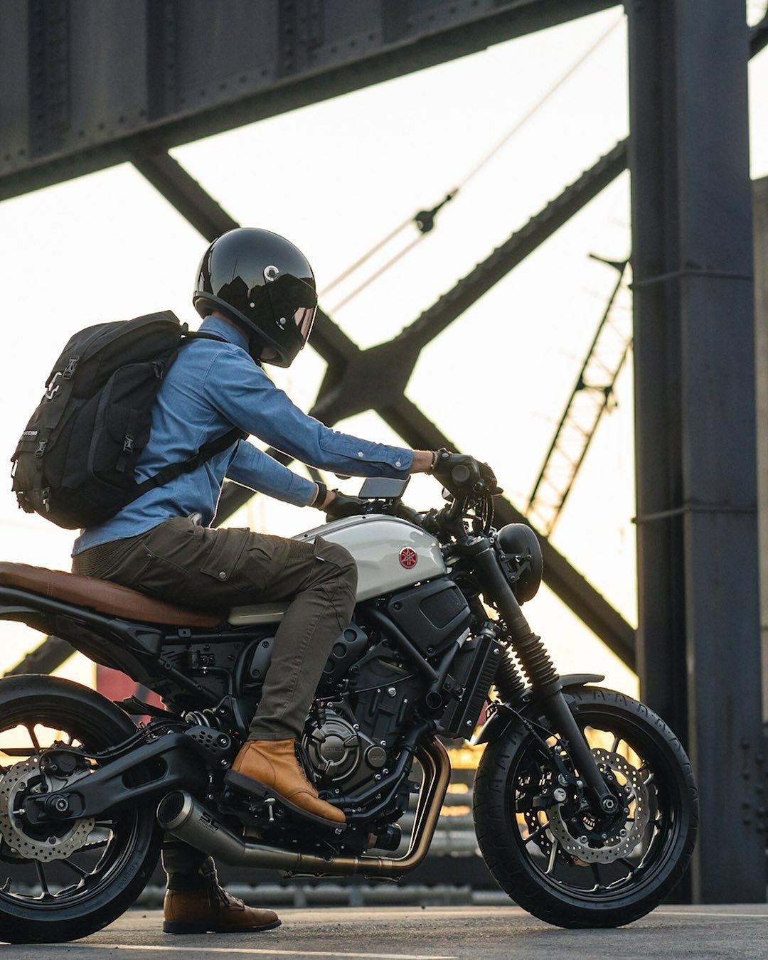 man riding yamaha motorcycle