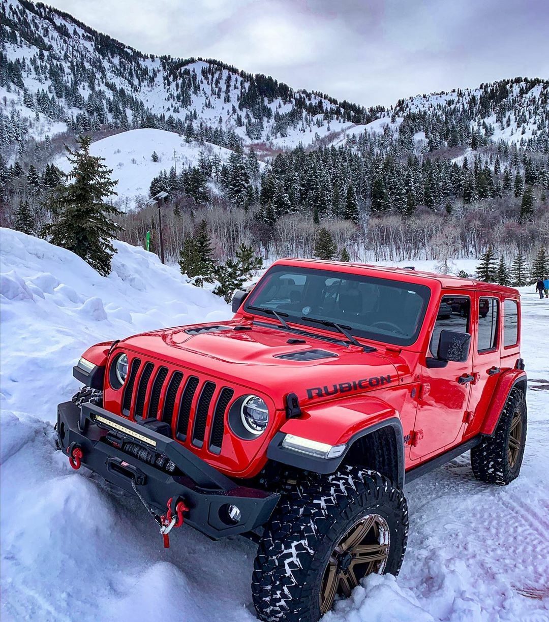 red rubicon in the snow