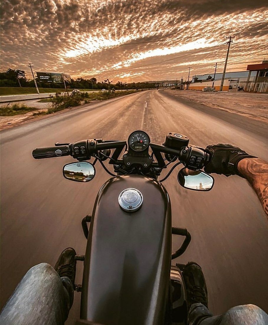 pov man riding motorcycle