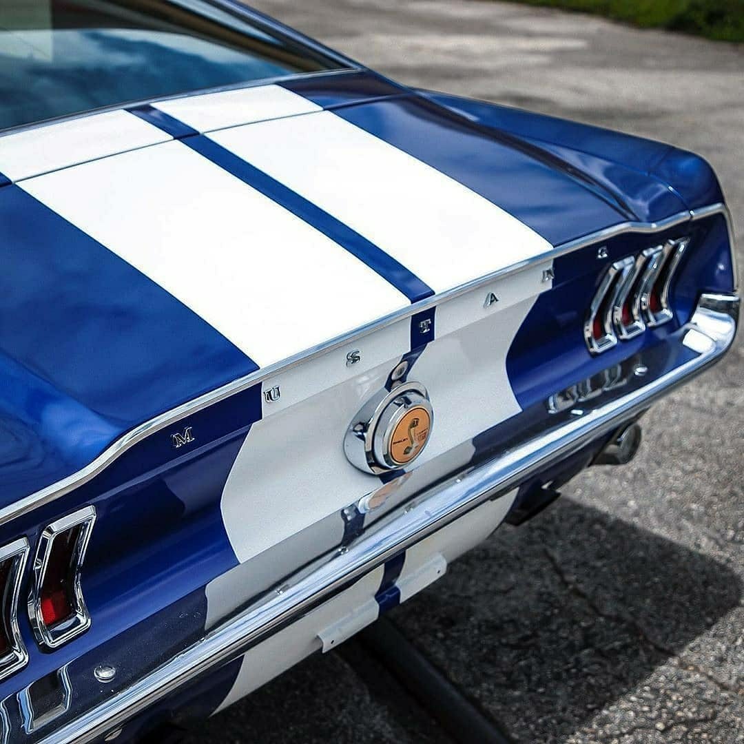 blue and white classic mustang rear end